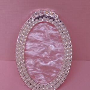 Exhibidor de mostrario (base para mezclas de gel uñas) forma de óvalo plateado con rosado  y perlas