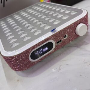 Estractor de polvo con cristal rosa