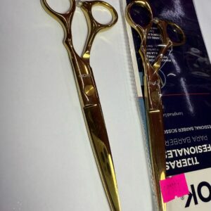 Tijera dorada para barbero